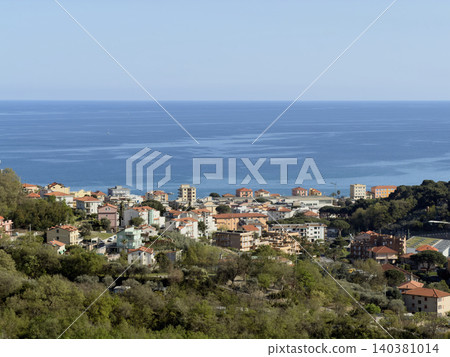 Coastal town overlooking the sea and hillside greenery Coastal town overlooking the sea and hillside greenery 140381014