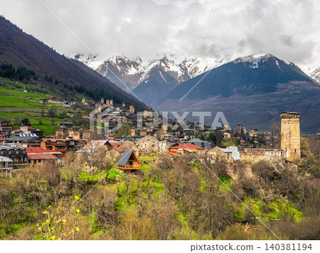 Distance view of the sunny Mestia,  Svaneti mountain region in Georgia. 140381194