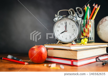Study workspace with textbooks and globe, educational achievement concept, copy space for text Study workspace with textbooks and globe, educational achievement concept, copy space for text 140382635