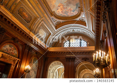 New york, usa august 22,2024. New york public library mcgraw rotunda featuring rich wooden paneling, chandeliers, and an ornate painted ceiling with classical murals 140383145