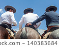 Three Horse Riders Wearing Traditional Andalusian Costume Seen from Behind Three Horse Riders Wearing Traditional Andalusian Costume Seen from Behind 140383684