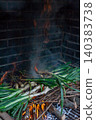 Grilled Typical Catalonian Food, Calcots Cooking Over Open Fire Grilled Typical Catalonian Food, Calcots Cooking Over Open Fire 140383738