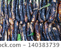 Traditional Catalan Calcots on Barbecue Fire Traditional Catalan Calcots on Barbecue Fire 140383739