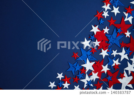 Red white blue star confetti on dark navy background Red white blue star confetti on dark navy background 140383787
