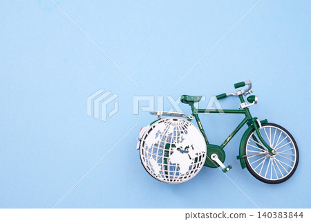 World bicycle day. Green bicycle with earth wheel representing sustainable transportation World bicycle day. Green bicycle with earth wheel representing sustainable transportation 140383844