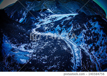 A stream splitting a glacier (Iceland) 140384756