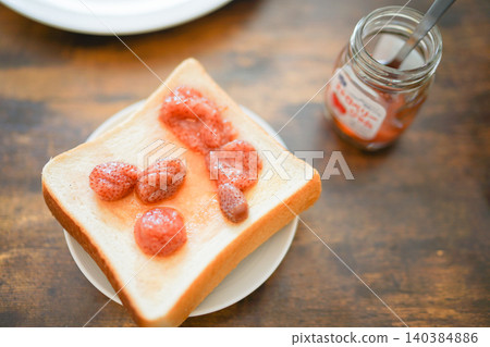 Strawberry jam and thick bread Strawberry jam and thick bread 140384886