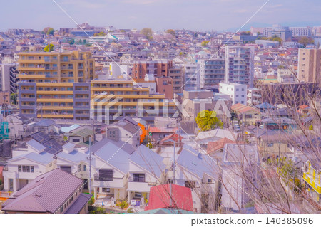 A city of rooftops and apartment buildings A city of rooftops and apartment buildings 140385096