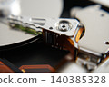 Image of disassembled hard disk drive Image of disassembled hard disk drive 140385328