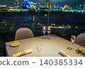 A glass of liquor and the city of Yokohama A glass of liquor and the city of Yokohama 140385334