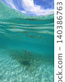 A refreshing photo of a half-submerged object. 140386763