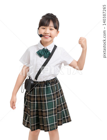 Asian schoolgirl cheering with headset microphone isolated on white background, motivation and encouragement concept Asian schoolgirl cheering with headset microphone isolated on white background, motivation and encouragement concept 140387265