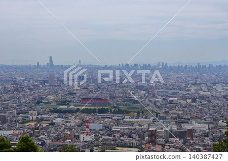 A view of Osaka cityscape from the Nukata Observatory in Hiraoka Park (Higashi-Osaka City, Osaka Prefecture) A view of Osaka cityscape from the Nukata Observatory in Hiraoka Park (Higashi-Osaka City, Osaka Prefecture) 140387427