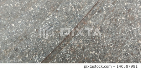 Grey terrazzo stone texture with diagonal joint lines. Grey terrazzo stone texture with diagonal joint lines. 140387981