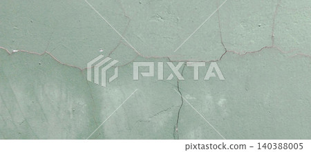 green cracked paint on a wall green cracked paint on a wall 140388005