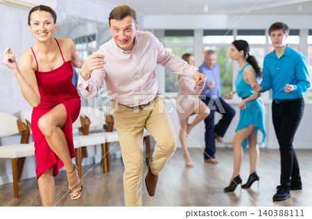 Adult couple dancing Adult couple dancing 140388111