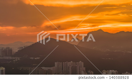 July 8 2022 Hong Kong mountains dramatic sunset rays 140388928
