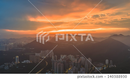 July 8 2022 Hong Kong urban sunset mountain skyline July 8 2022 Hong Kong urban sunset mountain skyline 140388930