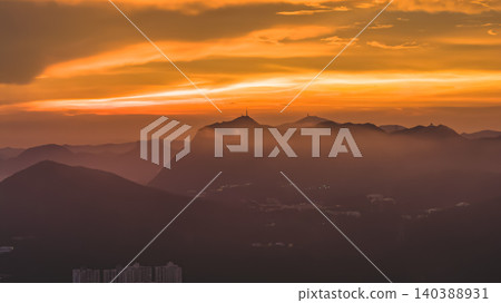 July 8 2022 Hong Kong mountains dramatic sunset rays July 8 2022 Hong Kong mountains dramatic sunset rays 140388931