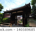 A Kamakura period structure designated as an Important Cultural Property. The east gate of Gangoji Temple bathed in the early summer sun. 140389685