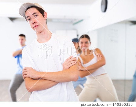 Young guy learning dance in dance studio 140390333
