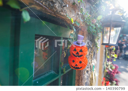 Orange tinsel pumpkin decoration by window for 2026 Halloween Orange tinsel pumpkin decoration by window for 2026 Halloween 140390799