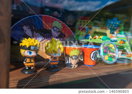 Naruto and Son Goku figures on shelf at souvenir store, Yufuin Naruto and Son Goku figures on shelf at souvenir store, Yufuin 140390803