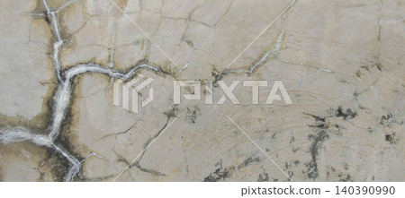 Cream marble texture with natural veins and cracks. Cream marble texture with natural veins and cracks. 140390990
