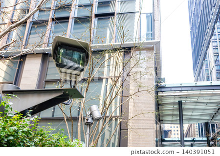 Surveillance cameras around the building Surveillance cameras around the building 140391051