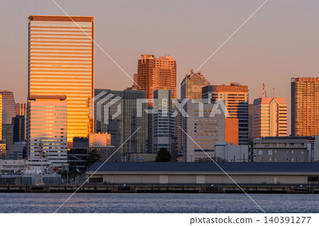 The skyscrapers along Tokyo Bay are bathed in the morning sun. The skyscrapers along Tokyo Bay are bathed in the morning sun. 140391277