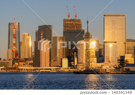 The cityscape of Tokyo Bay and Tokyo Tower bathed in the morning sun. The cityscape of Tokyo Bay and Tokyo Tower bathed in the morning sun. 140391349