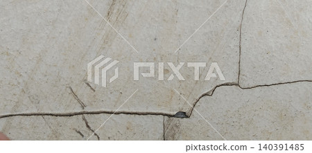 cracked concrete wall with cracks cracked concrete wall with cracks 140391485