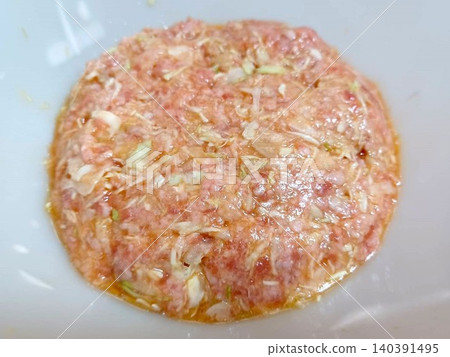 Preparing the ingredients for cabbage minced meat cutlets Preparing the ingredients for cabbage minced meat cutlets 140391495