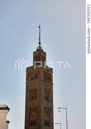 View of the clay minaret of the Moulay Youssef Mosque in Casablanca's historic Habous Quarter. 140392011
