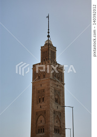 View of the clay minaret of the Moulay Youssef Mosque in Casablanca's historic Habous Quarter. View of the clay minaret of the Moulay Youssef Mosque in Casablanca's historic Habous Quarter. 140392012
