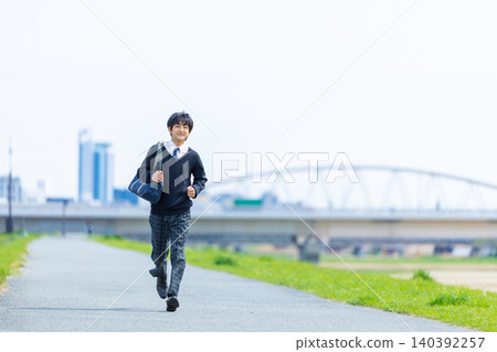 Running middle school student Running middle school student 140392257