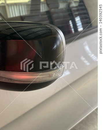 Close-up of scratched car side mirror Close-up of scratched car side mirror 140392545