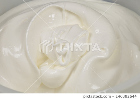 Whipped egg whites with sugar close up Whipped egg whites with sugar close up 140392644