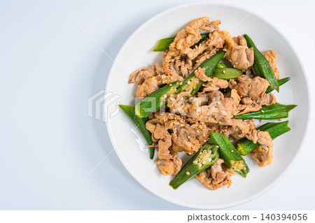 Stir-fried okra and pork, a Japanese-style dish with sesame flavor. Stir-fried okra and pork, a Japanese-style dish with sesame flavor. 140394056