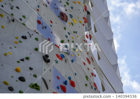 CopenHill innovative waste-to-energy power plant in Copenhagen that features a functioning artificial ski slope, hiking trails, and the world's tallest climbing wall on its roof 140394336