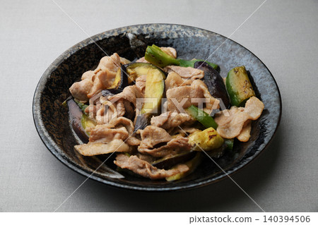 Stir-fried eggplant, green pepper and pork with miso Stir-fried eggplant, green pepper and pork with miso 140394506