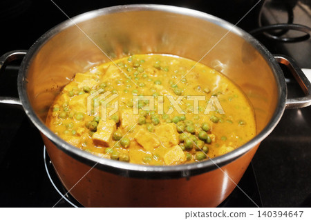 Chicken green curry with Turkey berry eggplant in aluminum pot, Traditional Thai food of Thailand 140394647