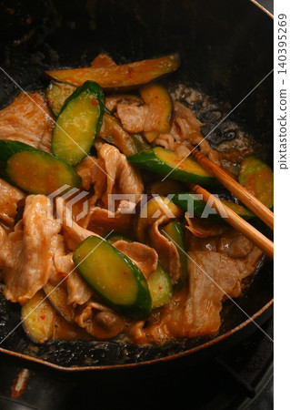 Cooking scene of stir-fried eggplant, cucumber, and pork with spicy miso Cooking scene of stir-fried eggplant, cucumber, and pork with spicy miso 140395269