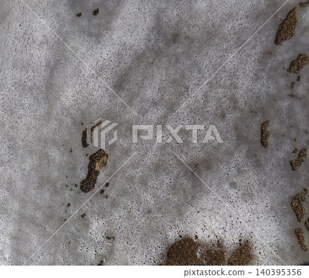 Sea foam on the seashore 140395356