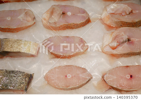 Fresh groupers Plectropomus garupa fish fillets raw slice variety seafood display buying various coral eat Epinephelidae counter in grocery store sale freshness food grouper meat in cold ice chilled Fresh groupers Plectropomus garupa fish fillets raw slice variety seafood display buying various coral eat Epinephelidae counter in grocery store sale freshness food grouper meat in cold ice chilled 140395370
