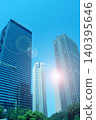 Skyscrapers and the shining sun 140395646
