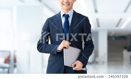 Male businessman with laptop Male businessman with laptop 140397108