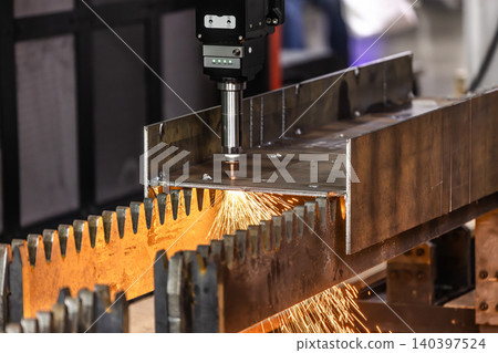 Industrial CNC laser cutting machine with flying sparks in metal fabrication. Industrial CNC laser cutting machine with flying sparks in metal fabrication. 140397524