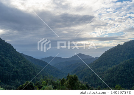 Mountain landscape near Tentena in Sulawesi, Indonesia under cloudy sky Mountain landscape near Tentena in Sulawesi, Indonesia under cloudy sky 140397578