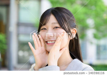 Japanese woman making a call Japanese woman making a call 140398116
